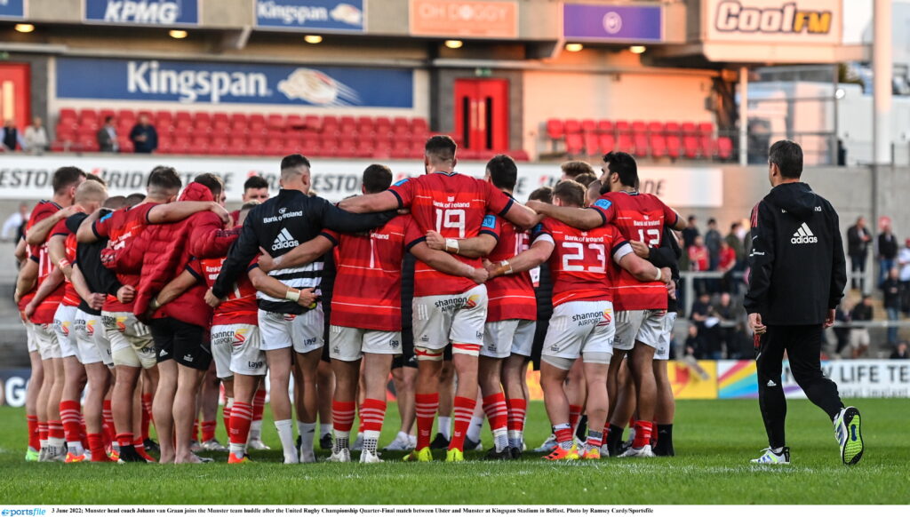 3 June 2022; Munster head coach Johann van Graan joins the Munster team huddle after the United Rugby Championship Quarter-Final match between Ulster and Munster at Kingspan Stadium in Belfast. Photo by Ramsey Cardy/Sportsfile