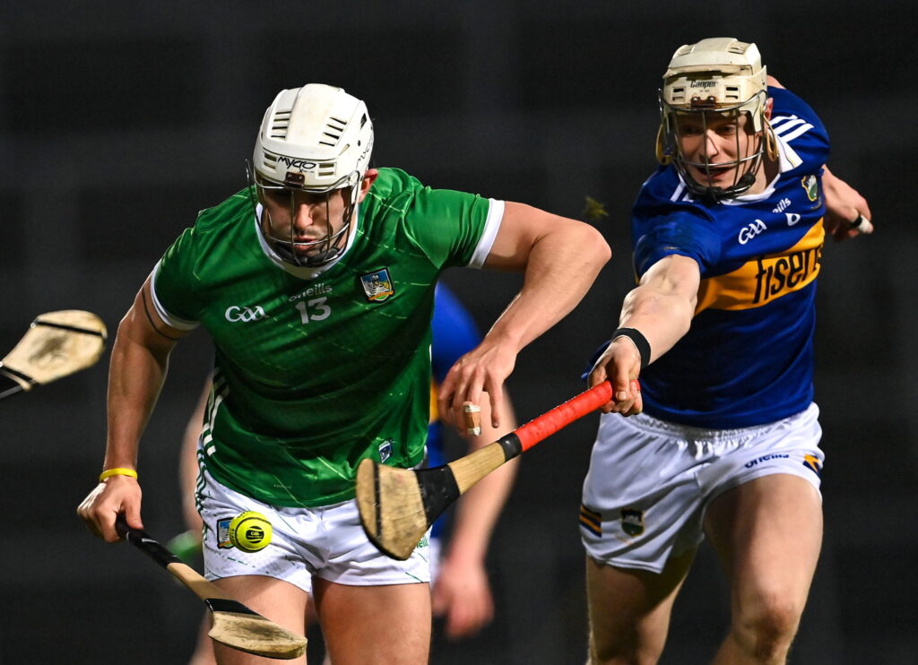 25 March 2023; Aaron Gillane of Limerick in action against Bryan O'Mara of Tipperary during the Allianz Hurling League Division 1 Semi-Final match between Limerick and Tipperary at TUS Gaelic Grounds in Limerick. Photo by Piaras Ó Mídheach/Sportsfile